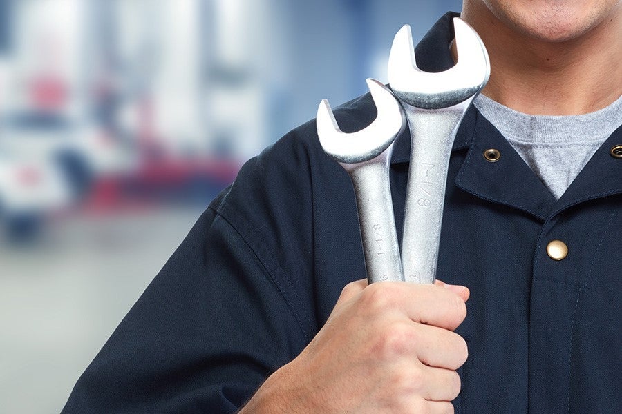A service Specialist Holding A Wrench